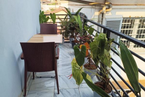 Vue imprenable sur ville et jardin